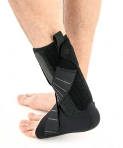 Releveur de pied avec deux rappels élastiques croisés